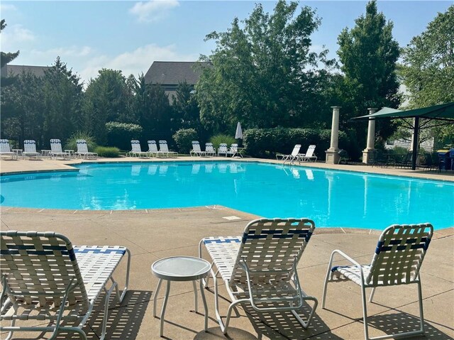 14814 Sherwood St, Leawood, KS 66224 - community pool with a patio