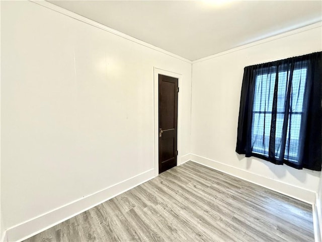 803 N Mulberry St, Maryville, MO 64468 - unfurnished room with wood finished floors and baseboards