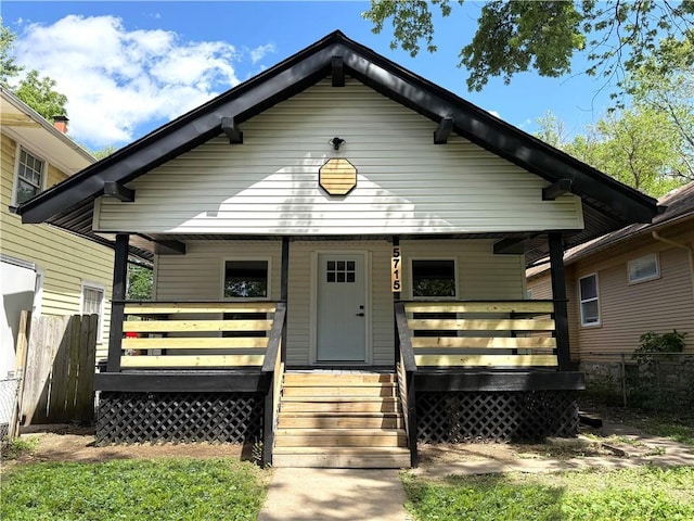5715 Forest Ave, Kansas City, MO 64110 - view of front facade with covered porch