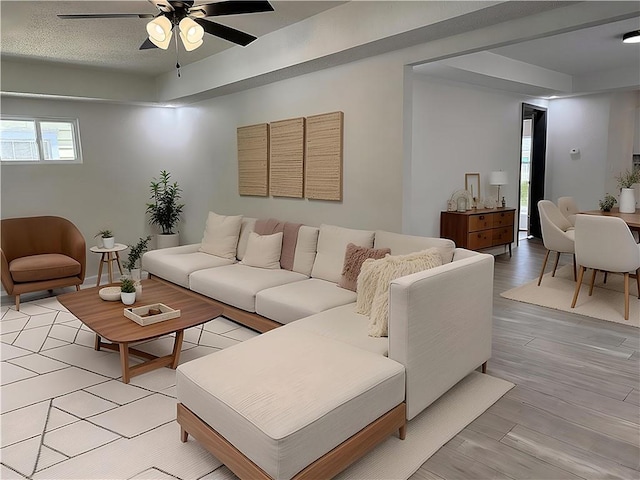 5715 Forest Ave, Kansas City, MO 64110 - living area with a ceiling fan