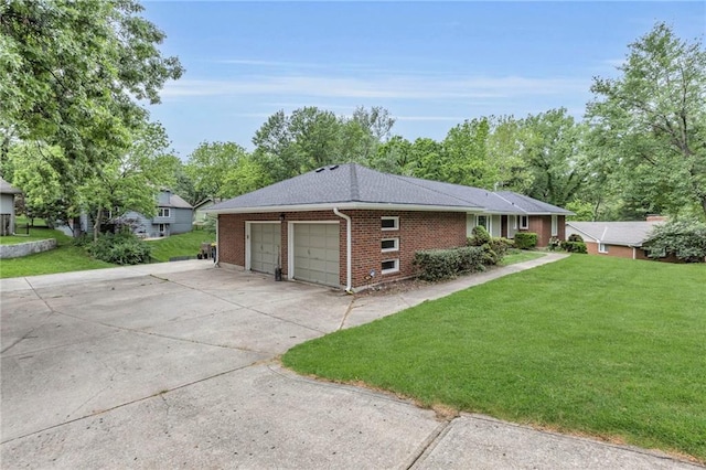 4212 NW Briarcliff Ln, Kansas City, MO 64116 - view of side of property featuring a garage, brick siding, a yard, driveway, and a shingled roof