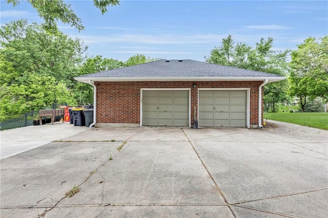 4212 NW Briarcliff Ln, Kansas City, MO 64116 - garage featuring concrete driveway