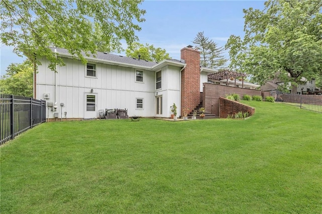 4212 NW Briarcliff Ln, Kansas City, MO 64116 - back of property with stairs, a chimney, and board and batten siding