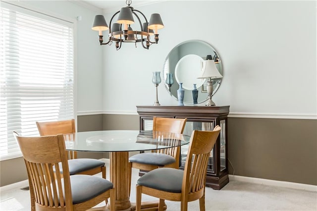 13238 Reeder St, Overland Park, KS 66213 - carpeted dining space featuring a chandelier, healthy amount of natural light, and baseboards