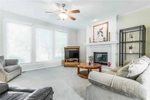 13238 Reeder St, Overland Park, KS 66213 - living room with a ceiling fan, baseboards, crown molding, carpet floors, and a fireplace