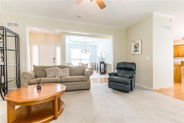 13238 Reeder St, Overland Park, KS 66213 - living area featuring a ceiling fan, ornamental molding, baseboards, and light carpet