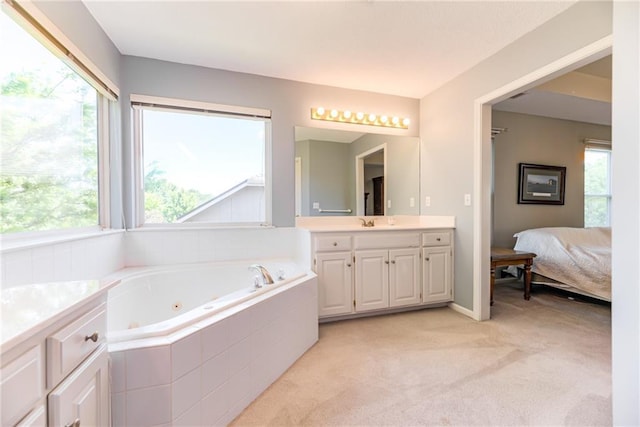 13238 Reeder St, Overland Park, KS 66213 - full bathroom featuring plenty of natural light, a jetted tub, and vanity