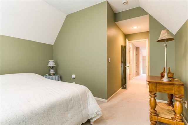 13238 Reeder St, Overland Park, KS 66213 - bedroom with lofted ceiling, light carpet, and baseboards
