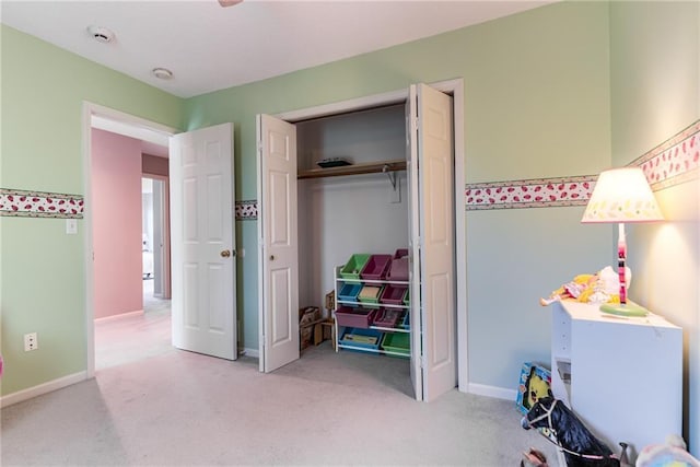 13238 Reeder St, Overland Park, KS 66213 - bedroom with light carpet, baseboards, and a closet