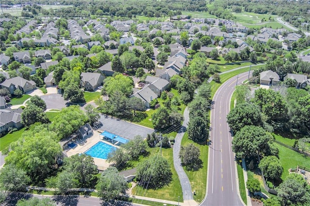 13238 Reeder St, Overland Park, KS 66213 - aerial perspective of suburban area with a pool area