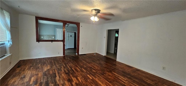 3118 Wallace Ave, Kansas City, MO 64129 - empty room featuring wood finished floors, a ceiling fan, and a textured ceiling