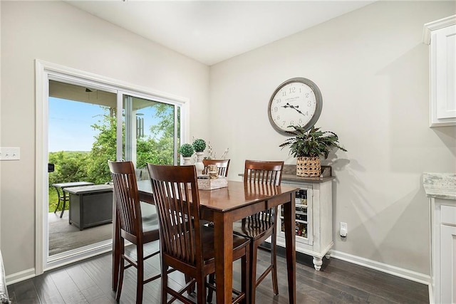 7812 NW 124th St, Kansas City, MO 64163 - dining space with dark wood-type flooring and baseboards