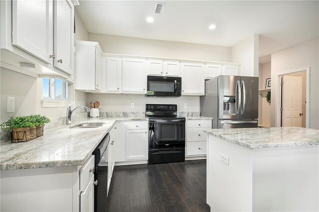 7812 NW 124th St, Kansas City, MO 64163 - kitchen featuring black appliances, a sink, white cabinets, dark wood-type flooring, and recessed lighting
