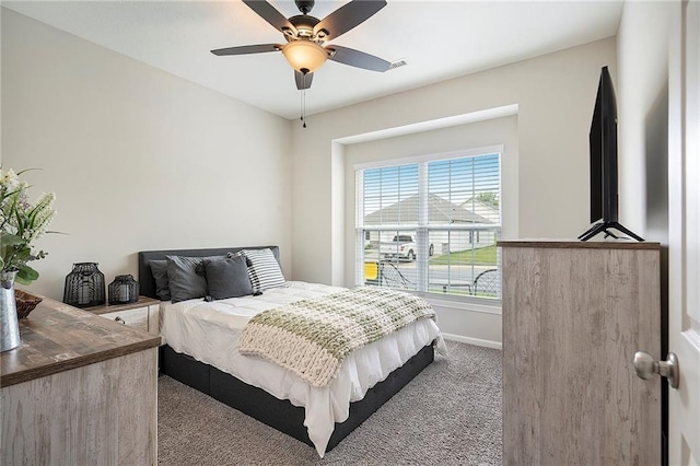 7812 NW 124th St, Kansas City, MO 64163 - carpeted bedroom featuring baseboards and ceiling fan