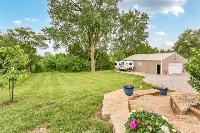 20440 147th St, Basehor, KS 66007 - view of grassy yard featuring a garage and an outdoor structure