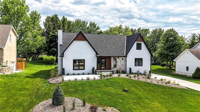 5263 SW Raintree Pkwy, Lees Summit, MO 64082 - view of front facade featuring a front yard, a chimney, and a shingled roof