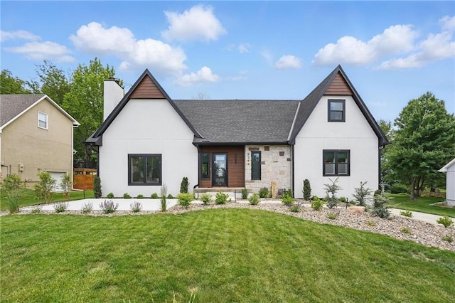 5263 SW Raintree Pkwy, Lees Summit, MO 64082 - view of front of home with a front yard, roof with shingles, a chimney, and stucco siding
