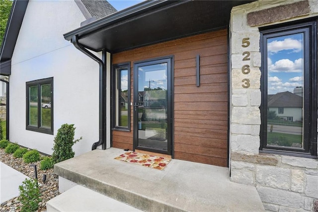 5263 SW Raintree Pkwy, Lees Summit, MO 64082 - entrance to property featuring stucco siding and stone siding