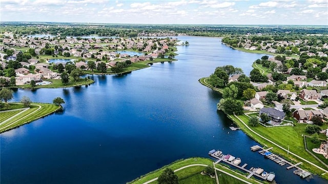 5263 SW Raintree Pkwy, Lees Summit, MO 64082 - aerial view of residential area with a nearby body of water