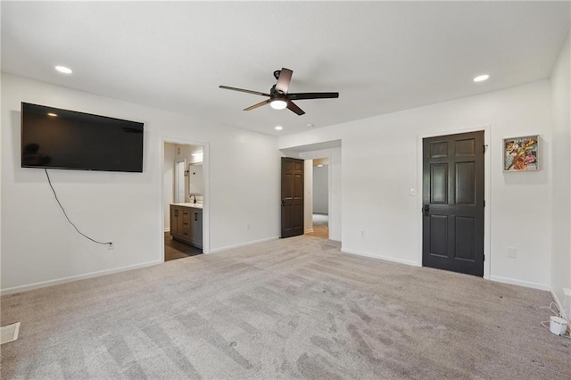 5263 SW Raintree Pkwy, Lees Summit, MO 64082 - unfurnished bedroom with carpet flooring, recessed lighting, baseboards, connected bathroom, and ceiling fan