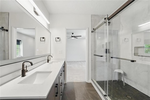5263 SW Raintree Pkwy, Lees Summit, MO 64082 - bathroom with a ceiling fan, double vanity, and a stall shower