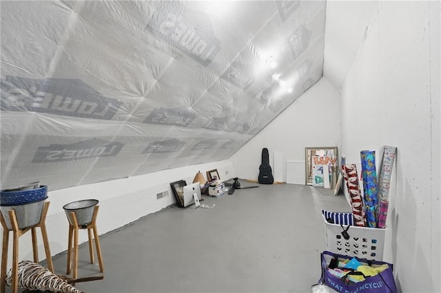5263 SW Raintree Pkwy, Lees Summit, MO 64082 - additional living space featuring finished concrete floors and vaulted ceiling