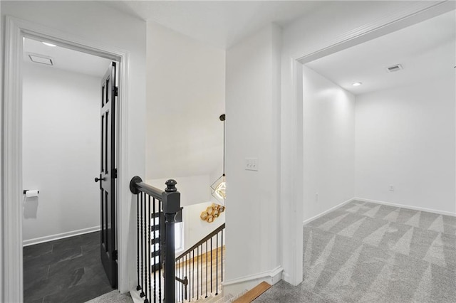 5263 SW Raintree Pkwy, Lees Summit, MO 64082 - hall with an upstairs landing, carpet flooring, and baseboards