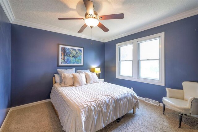 5608 Outlook St, Mission, KS 66202 - bedroom featuring carpet flooring, baseboards, ornamental molding, a ceiling fan, and a textured ceiling