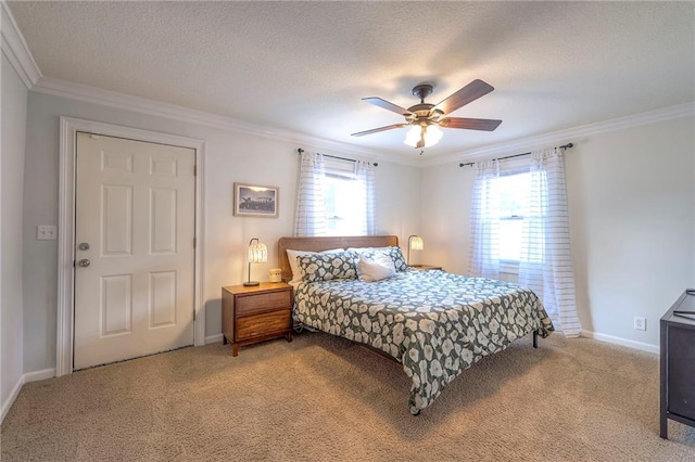 5608 Outlook St, Mission, KS 66202 - bedroom featuring light carpet, ornamental molding, baseboards, a textured ceiling, and ceiling fan