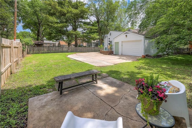 5608 Outlook St, Mission, KS 66202 - view of yard with an outbuilding, a patio area, and a garage