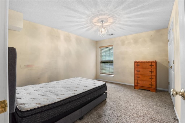 13825 Woodmont Ave, Bonner Springs, KS 66012 - bedroom with carpet flooring, baseboards, and a chandelier