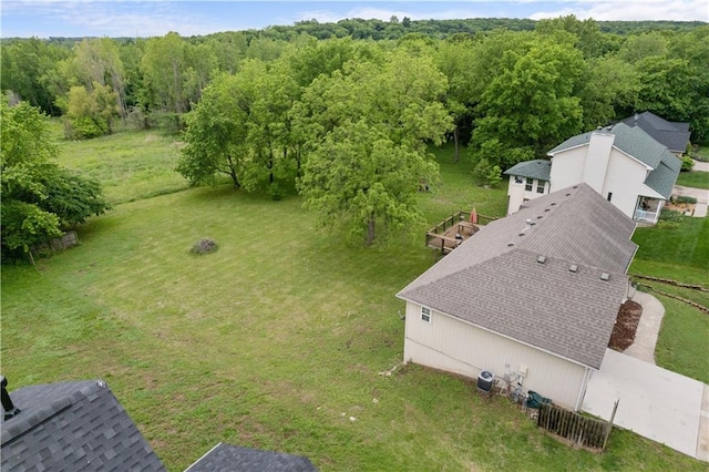 13825 Woodmont Ave, Bonner Springs, KS 66012 - aerial view of property and surrounding area with a heavily wooded area