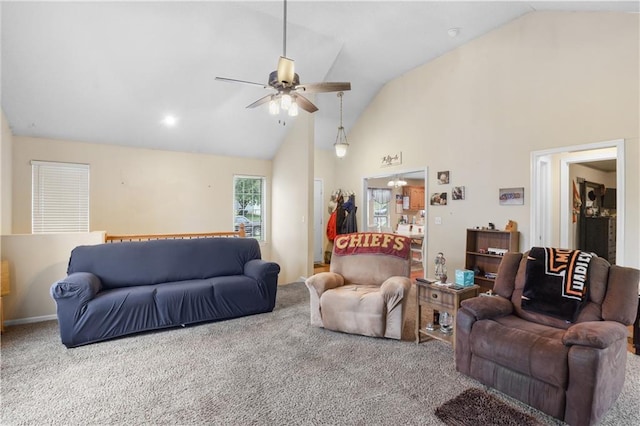 13825 Woodmont Ave, Bonner Springs, KS 66012 - carpeted living area with a ceiling fan and high vaulted ceiling