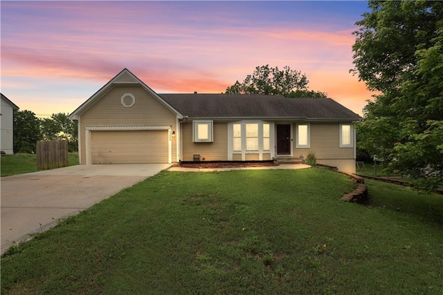 13825 Woodmont Ave, Bonner Springs, KS 66012 - single story home featuring concrete driveway, an attached garage, and a front yard