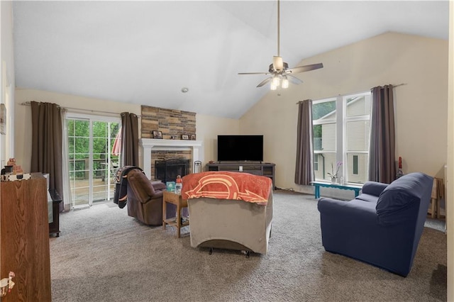 13825 Woodmont Ave, Bonner Springs, KS 66012 - living area with lofted ceiling, carpet, a fireplace, and ceiling fan