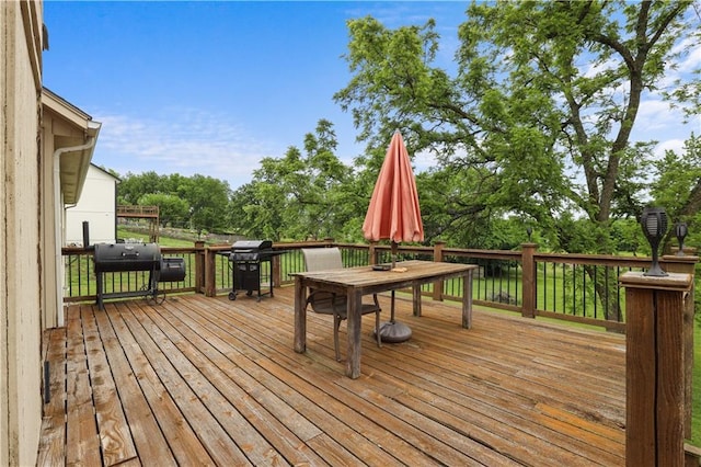 13825 Woodmont Ave, Bonner Springs, KS 66012 - wooden terrace featuring area for grilling, outdoor dining space, and view of scattered trees