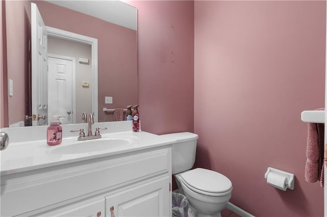 13825 Woodmont Ave, Bonner Springs, KS 66012 - half bathroom featuring toilet and vanity