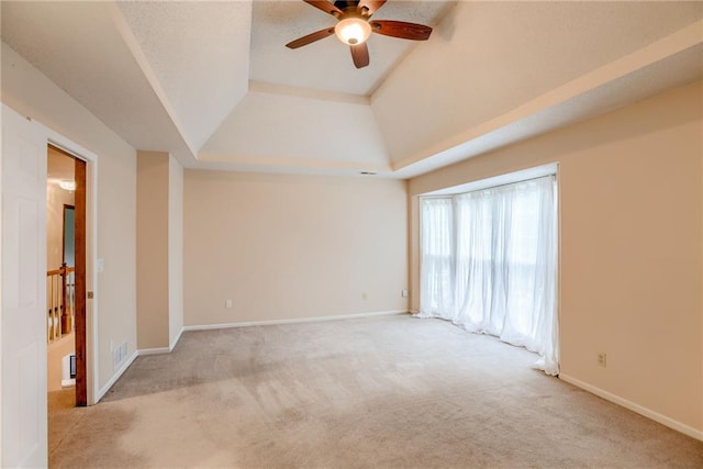 16482 W 132nd Cir, Olathe, KS 66062 - empty room with carpet floors, a ceiling fan, a raised ceiling, and baseboards