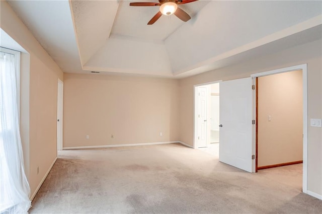 16482 W 132nd Cir, Olathe, KS 66062 - empty room featuring ceiling fan, light carpet, baseboards, and a raised ceiling