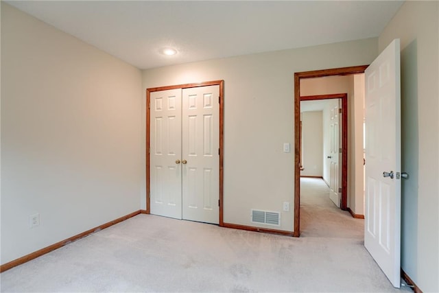 16482 W 132nd Cir, Olathe, KS 66062 - unfurnished bedroom with light carpet, baseboards, and a closet
