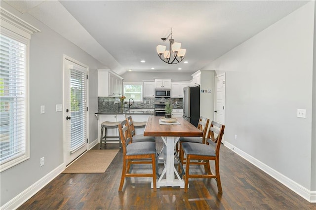 2511 E Maple Ct, Tonganoxie, KS 66086 - dining space with a chandelier, dark wood-style floors, baseboards, and recessed lighting