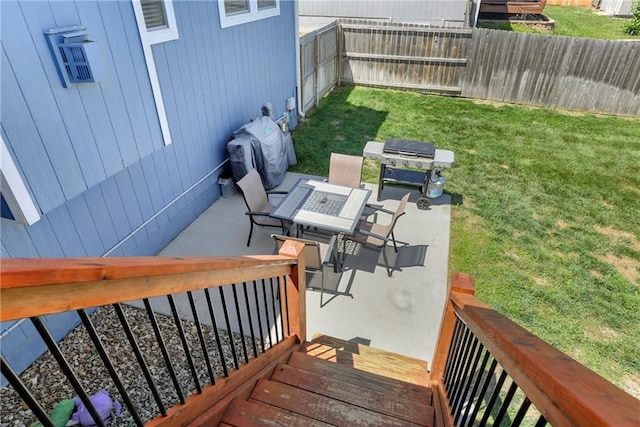 2511 E Maple Ct, Tonganoxie, KS 66086 - wooden deck with a patio area and outdoor dining area