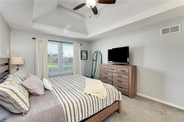 2511 E Maple Ct, Tonganoxie, KS 66086 - bedroom with a raised ceiling, light carpet, ceiling fan, and baseboards