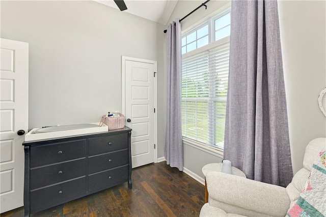 2511 E Maple Ct, Tonganoxie, KS 66086 - sitting room featuring dark wood-type flooring, vaulted ceiling, and baseboards