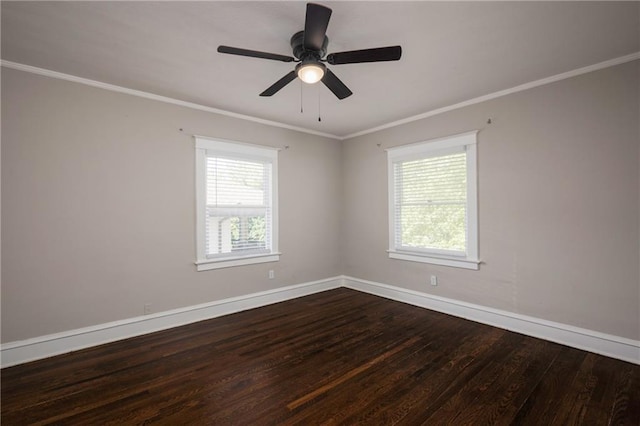 4219 Kenwood Ave, Kansas City, MO 64110 - empty room featuring dark wood finished floors, crown molding, and ceiling fan