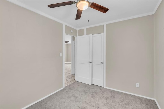 712 NE 45th St, Kansas City, MO 64116 - unfurnished bedroom with carpet floors, crown molding, baseboards, and ceiling fan