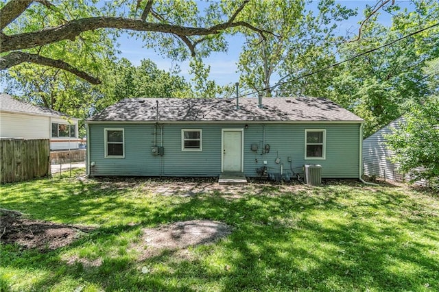 712 NE 45th St, Kansas City, MO 64116 - rear view of house featuring central AC and entry steps