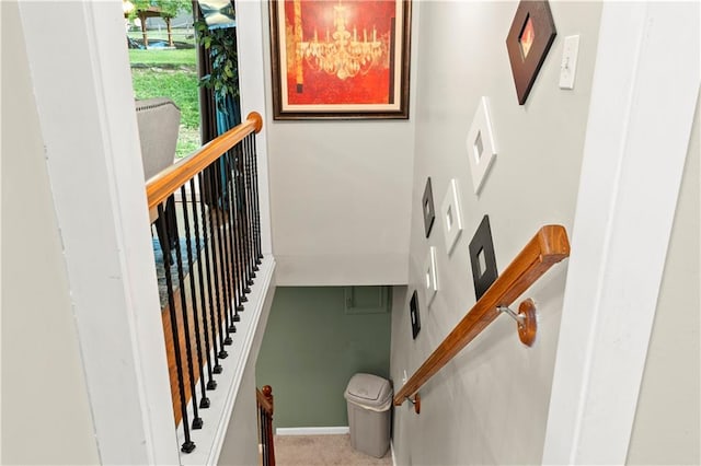 15205 E 40th St S, Independence, MO 64055 - stairway featuring a towering ceiling, baseboards, and carpet