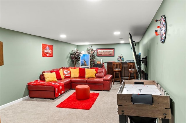 15205 E 40th St S, Independence, MO 64055 - living area featuring carpet, recessed lighting, a bar, and baseboards