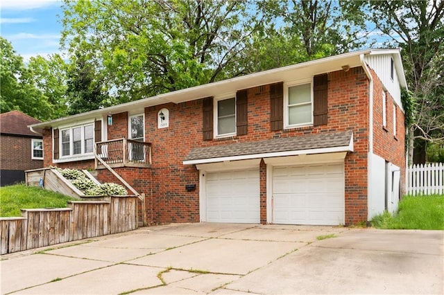 15205 E 40th St S, Independence, MO 64055 - view of front of house with an attached garage, brick siding, and driveway